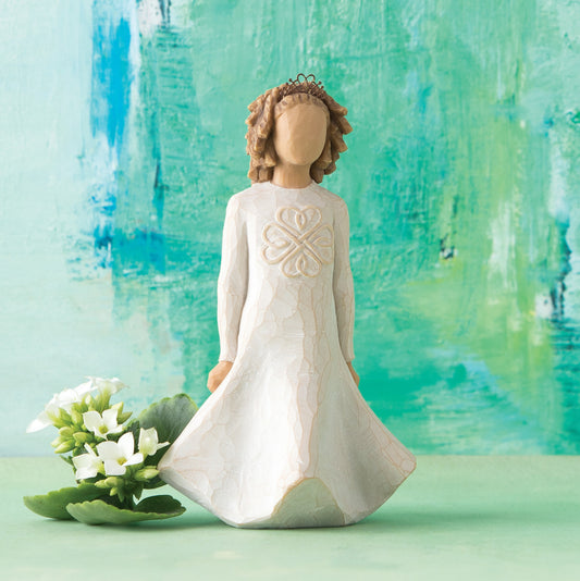 Willow Tree Irish Charm, 5.5" hand-painted dancing resin figure in cream dress with full skirt carved with stylized Celtic knot, arms down to sides, wire crown of hearts, in front of blue-green painting