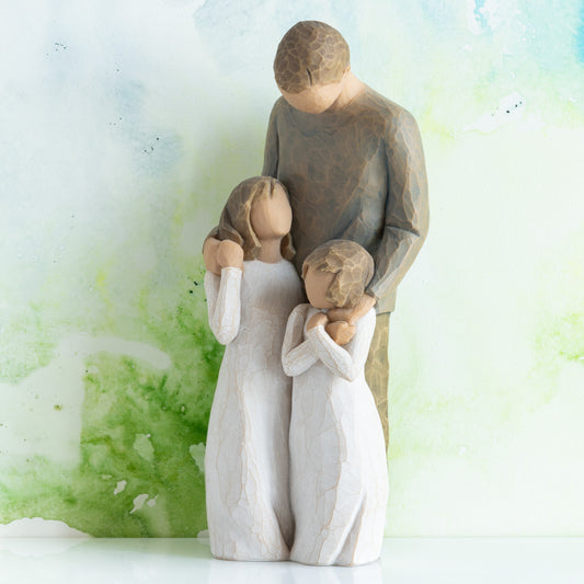 Willow Tree My Girls, 8"h hand-painted standing resin figure of father with arms around two young girls, all in neutral clothing, in front of green painting