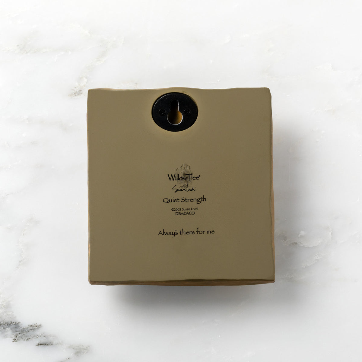 Back of olive-colored plaque reading "Quiet Strength" with Willow Tree logo