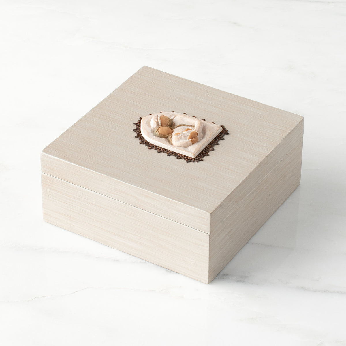 Side view: hand-painted cream square wood box, with hinged lid